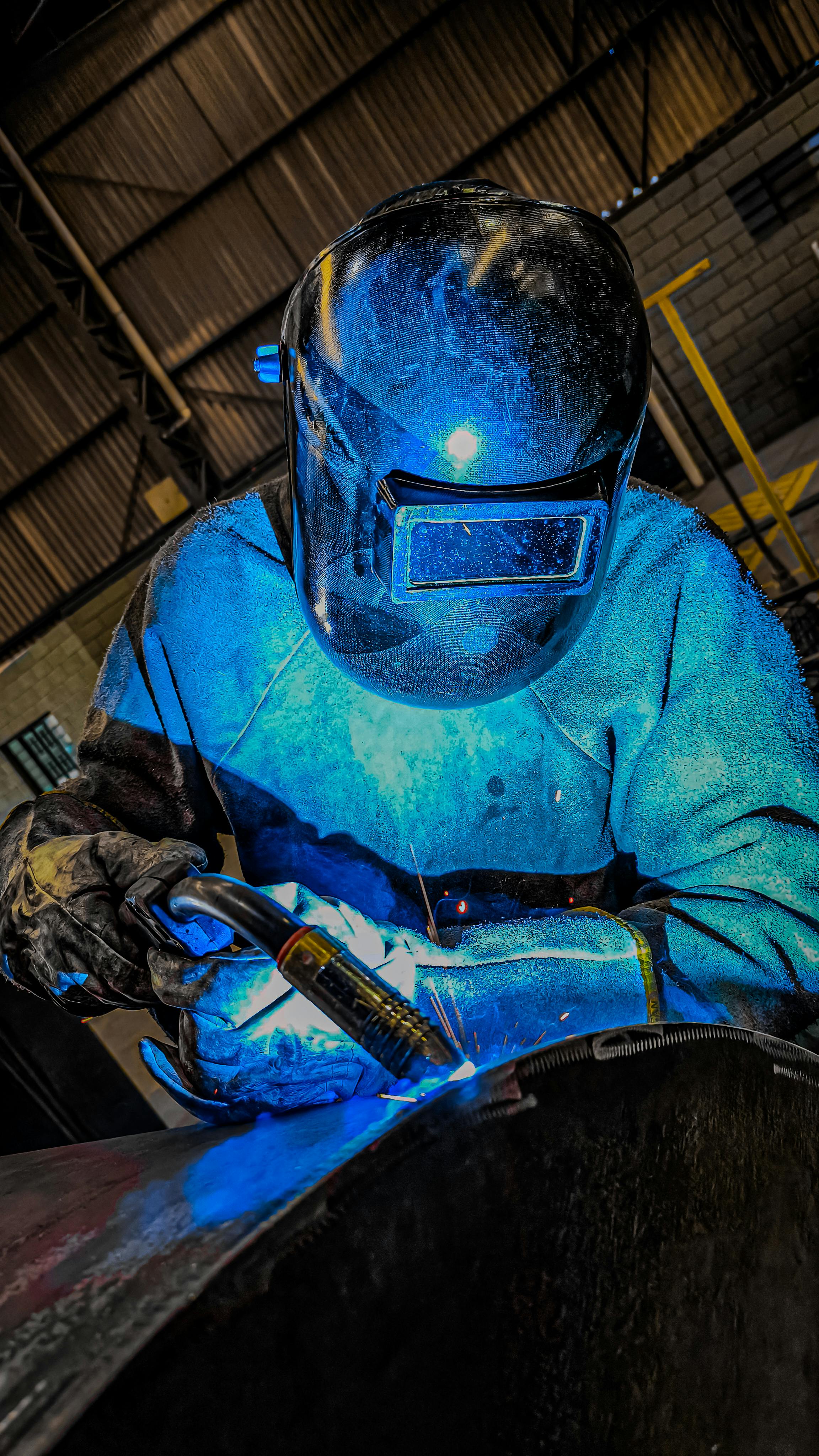 IATF 16949 Lead Auditor Training - Person welding