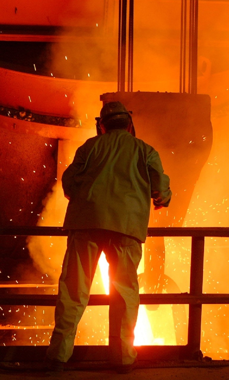 Supplier Audit - Person looking in to Steel Lava