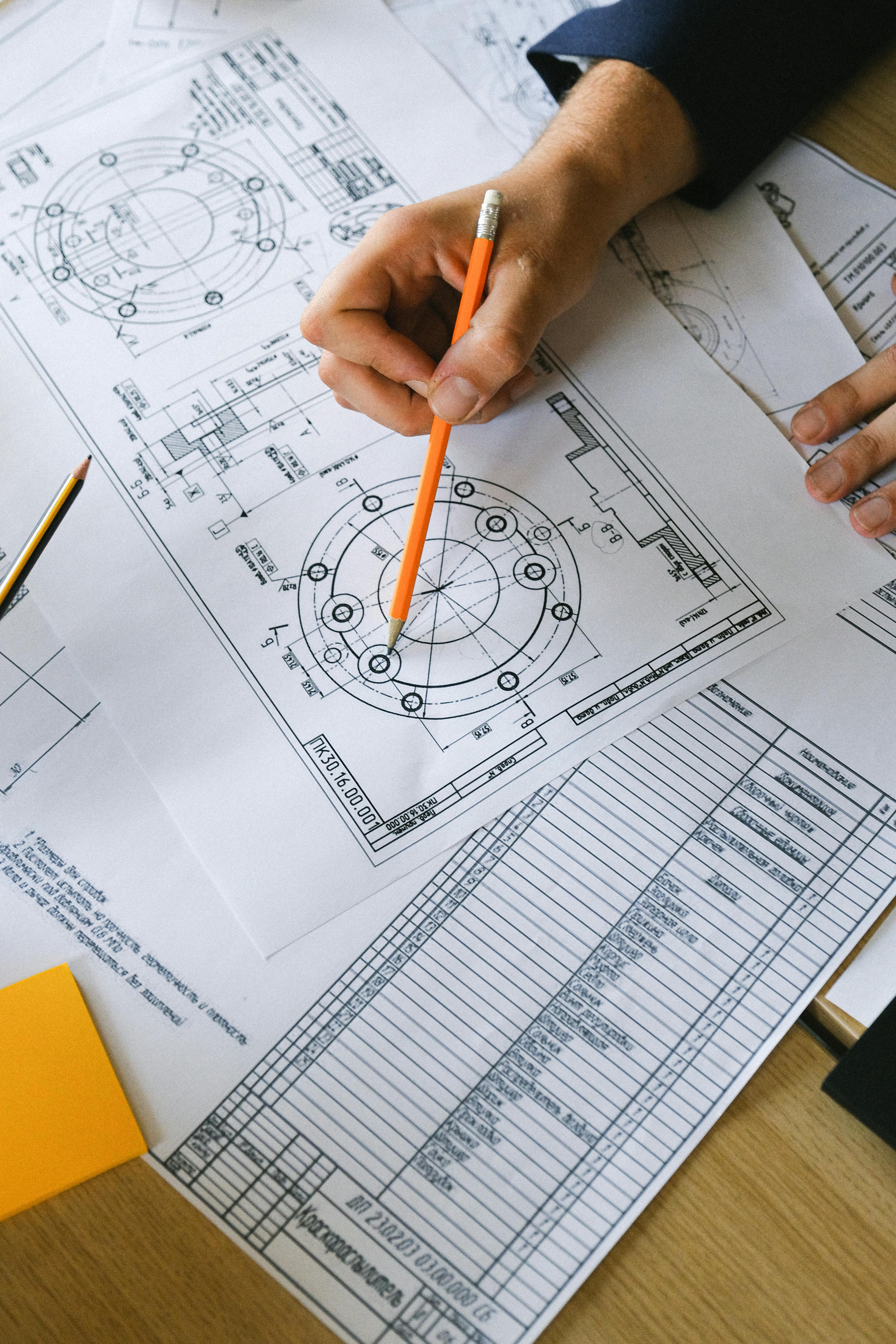 Geometric Dimensioning and Tolerancing - Person marking on technical drawings