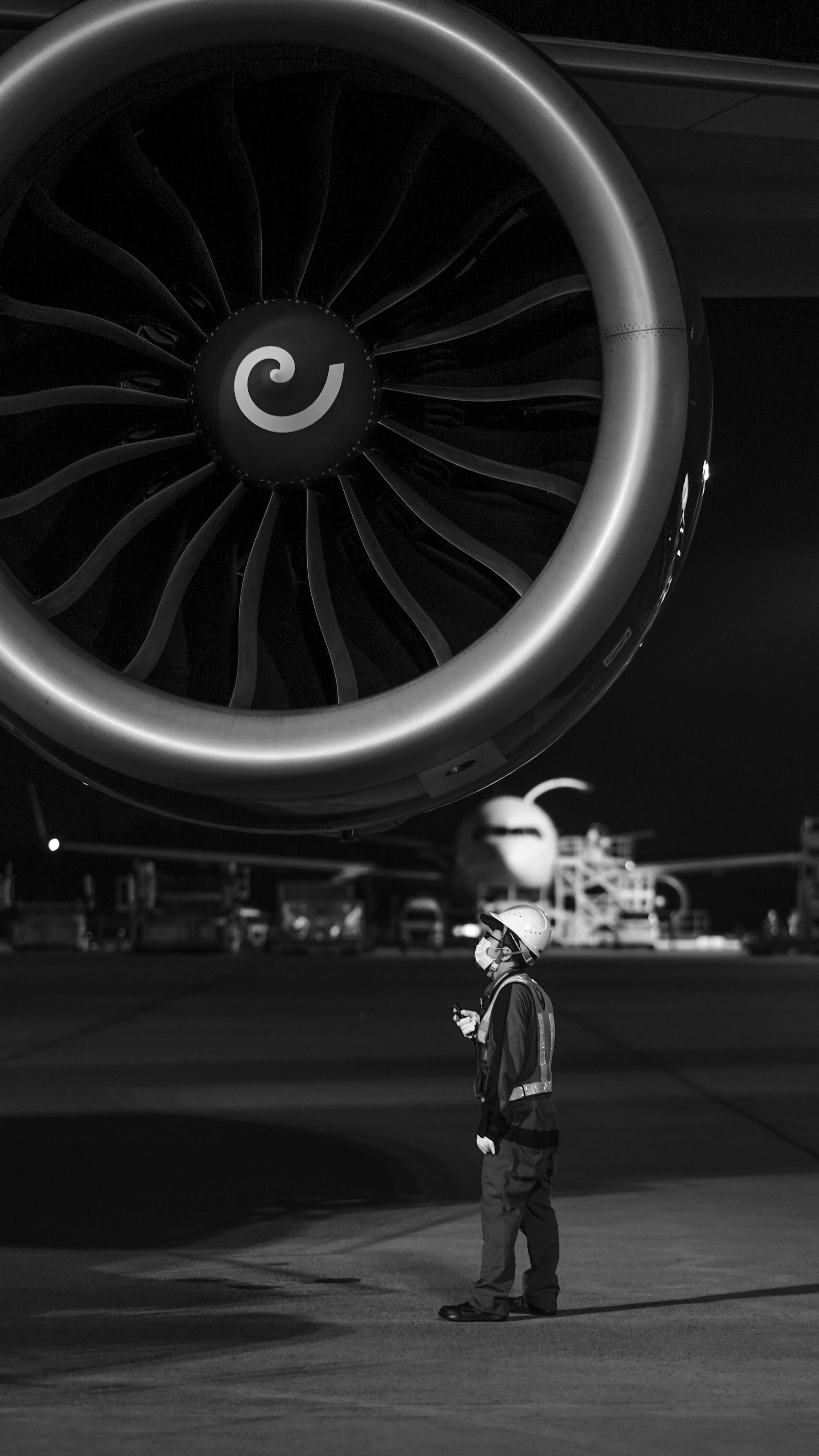 DPRV - Person looking up at airplane engine